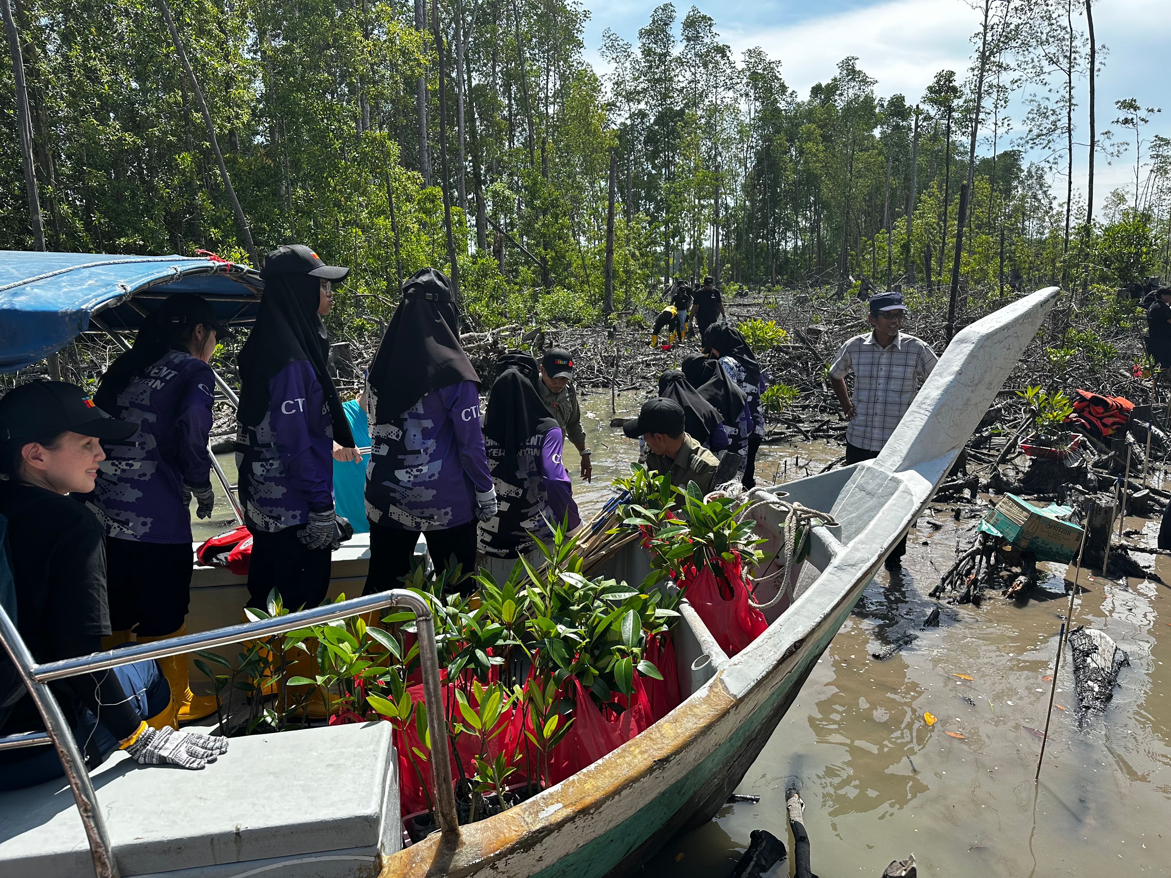 Students from SMK Convent Teluk Intan volunteered to plant the trees in Matang Mangrove Eco Forest Reserve.jpg